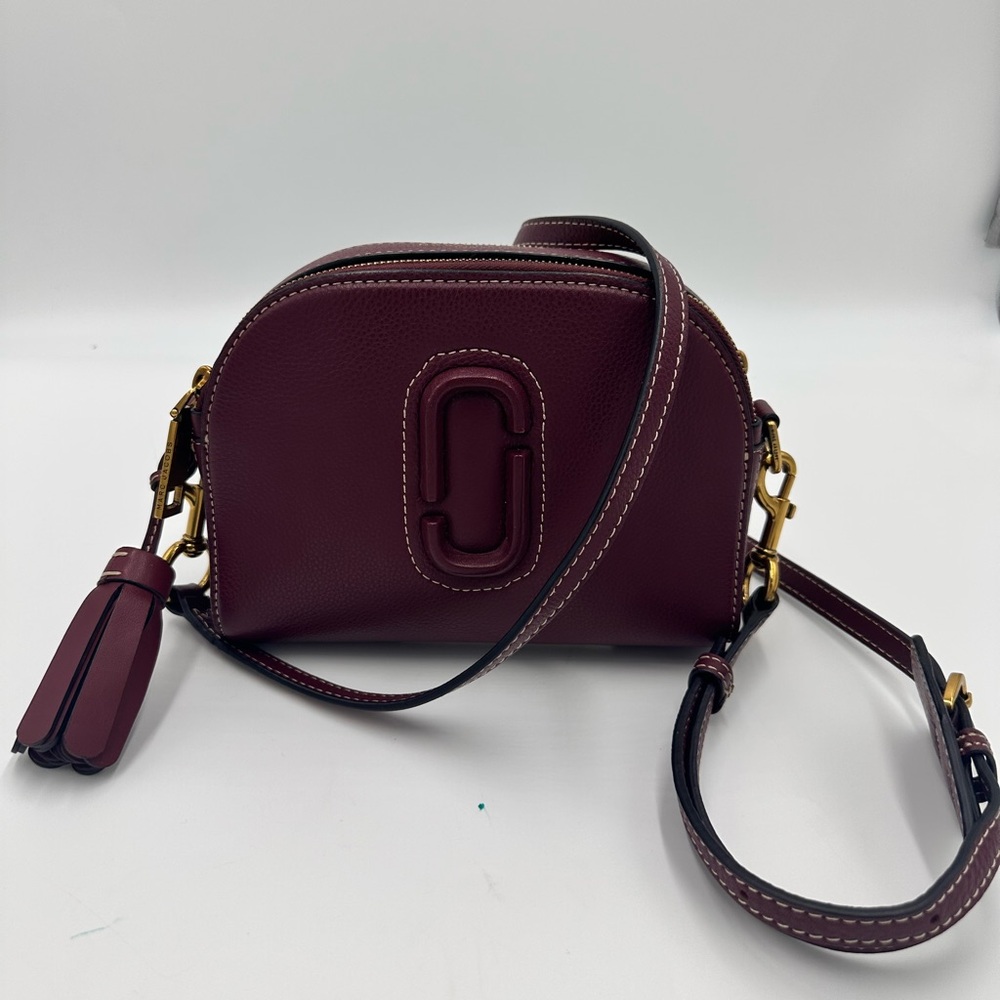 MARC JACOBS
Calfskin Shutter Camera Crossbody
Bag Deep Maroon